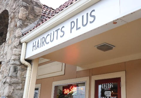 Haircuts Plus Sign outside of Salon